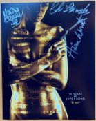 James bond multiple signed 50 years of James bond colour photo signed by Madeline Smith, Martine