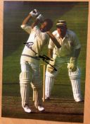 Cricket Sir Gary Sobers signed superb colour 12 x 8 batting action photo. Good condition. All