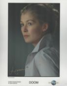 Rosamund Pike signed 10x8 inch Doom colour promo photo. Good condition. All autographs are genuine