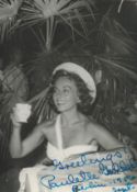 Paulette Goddard, a signed 6x4 photo postcard, dated Berlin Sept 1956. An American actress notable