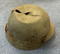 WW2 German Helmet with wire, Has a large hole and split in a dented top, no liner or chin strap,