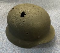 WW2 German Helmet with remains of Liner intact, Appears to have several rust holes in the top,