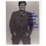 Elton John signed 10x8 inch black and white photo dedicated. Good condition. All autographs are