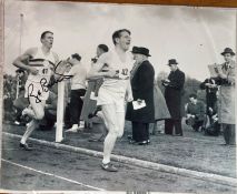 Sir Roger Bannister 4 min mile athlete signed 10 x 8 inch b/w running action photo. Sir Roger