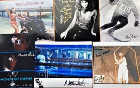 James Bond signed photo collection. Ten 10 x 8 inch photos including Martine Beswick, Willy