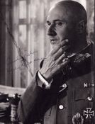 Donald Pleasance signed 10x7 inch black and white photo. Good condition. All autographs are