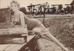 Brigitte Bardot signed 7x5 black and white photo. Good condition. All autographs are genuine hand