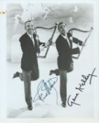 Fred Astaire and Gene Kelly signed 10x8 inch black and white photo. Slight blemish top left photo