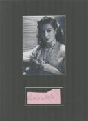 Deborah Kerr, 1921-2007, Actress Signed Page With 11x15 Mounted Photo. Good condition. All