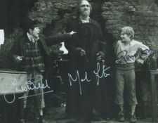 Oliver multi signed 10x8 inch black and white photo includes cast members Jack Wild, Mark Lester and