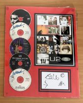 U2 20x16 inch multi signed mounted display includes signed album paged 5 compact discs and colour