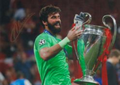 Football Alisson Becker signed 12x8 inch colour photo pictured celebrating with champions league