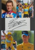 Cycling. Bradley Wiggins Signed Signature Card with 5 Colour Photos Attached to A4 Black Card.