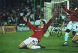 Football Ole Gunnar Solskjaer signed 12x8 inch colour photo pictured celebrating after scoring for