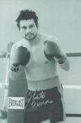 Boxing Roberto Duran signed 12x8 inch black and white photo. Good condition. All autographs are