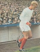 Football Denis Law signed 11x9 inch colour magazine photo pictured during his time with Manchester