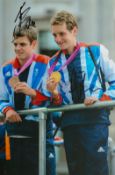 Olympics Triathlon Alastair and Johnny Brownlee Signed 12 x 8 inch Colour Cycling Photo. Signed in