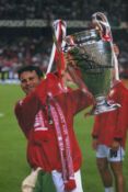 Football Ryan Giggs signed 12x8 inch colour photo pictured celebrating with the champions Leagur