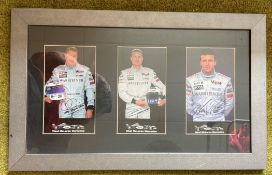 Formula One Mercedes Autograph display. Three signed promo photos with PRINTED autographs, Kimi
