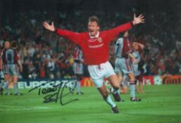 Football Teddy Sheringham signed 12x8 inch colour photo pictured celebrating after scoring for