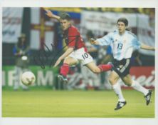 Football Michael Owen signed 10x8 inch colour photo pictured while playing for England against