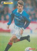 Football Brian Laudrup signed 11x9 inch colour magazine photo pictured while playing for Rangers