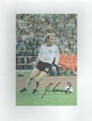 Football Uli Hoeness signed 10x8 inch colour photo pictured in action for West Germany. Good