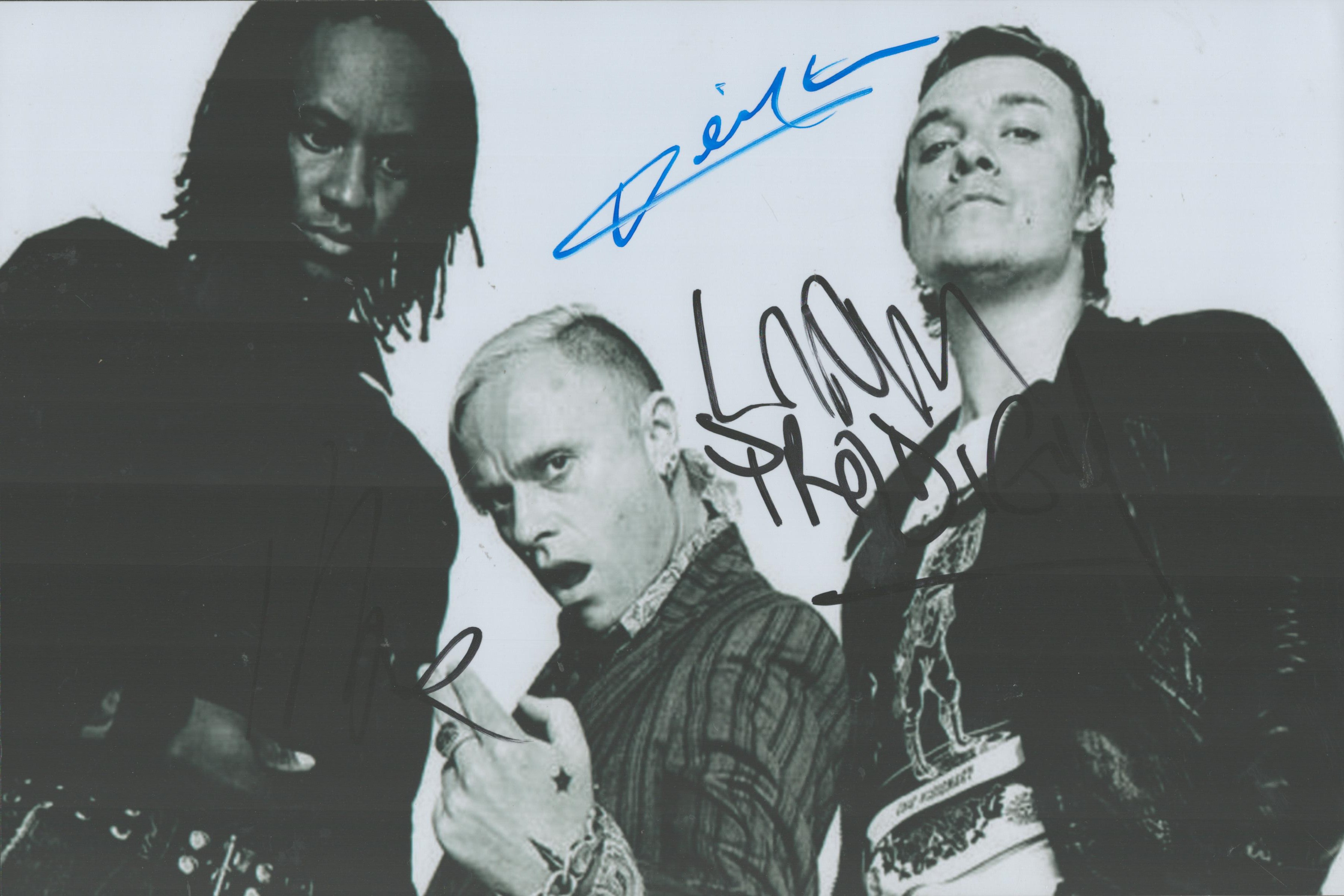 Prodigy signed 12x8inch black and white photo. Signed by all 3. Good condition. All autographs are
