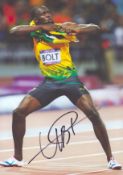 Athletics Usain Bolt signed 12x8 inch colour photo. Good condition. All autographs are genuine