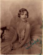 Mary Pickford (1892-1979), a signed (in green ink), 9x7 vintage photo. She was an actress, producer,