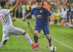 LUKE SHAW signed Manchester United 8x12 Photo. Good condition. All autographs are genuine hand