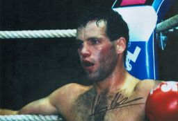 Henry Maske signed 12x8inch colour photo. Good condition. All autographs are genuine hand signed and