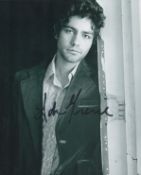 Adrian Grenier signed 10x8 inch black and white photo. Good condition. All autographs are genuine