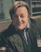 Stephen Fry signed 10x8 inch colour photo. Good condition. All autographs are genuine hand signed