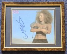 Mel B signed Melanie Brown colour photo 6.5x5.5 Inch mounted in a Brown Frame 10x8 Inch. The Spice