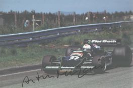 Formula 1 Arturo Merzario signed 12 x 8 racing action photo. A racing driver from Italy. He