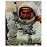 Walt Cunningham signed 10x8 inch colour photo pictured in space suit. From single vendor Space