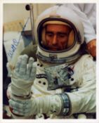 Walt Cunningham signed 10x8 inch colour photo pictured in space suit. From single vendor Space