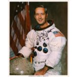 James A. McDivitt signed NASA original 10x8 inch colour photo pictured in space suit. From single