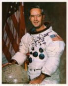 James A. McDivitt signed NASA original 10x8 inch colour photo pictured in space suit. From single