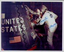 Scott Carpenter signed 10x8inch colour photo in spacesuit just about to climb into shuttle. From