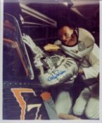 Wally Schirra signed 10x8inch colour photo in spacesuit entering shuttle. From single vendor Space
