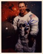 James Lovell JR signed 10x8 inch colour photo pictured in space suit. From single vendor Space
