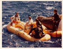 Charles Conrad JR signed 10x8 inch colour photo pictured in dingy after landing. From single