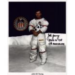 John W. Young signed 10x8 inch colour photo pictured in white space suit. From single vendor Space
