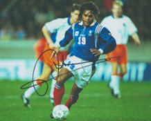 Football Christian Karembeau signed 10x8 inch colour photo pictured in action for France. Good