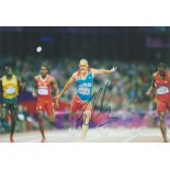 Athletics Felix Sanchez signed 12x8 inch colour photo. Felix Sanchez, (born August 30, 1977) is a