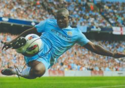 Football Micah Richards signed 12x8 inch colour photo pictured in action for Manchester City. Good