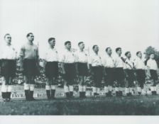 Football Tom Finney signed 10x8 inch vintage black and white photo pictured lining up for England.