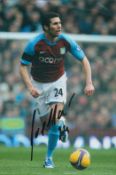 Football Carlos Cuellar signed 12x8 inch colour photo pictured in action for Aston Villa. Good